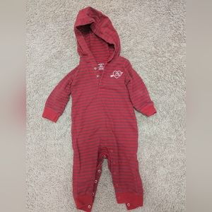 Baby one piece with a hood.